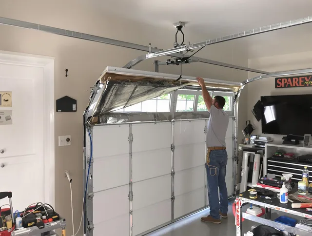 Garage door section replacement by Foxborough Garage Door Repair in Foxborough