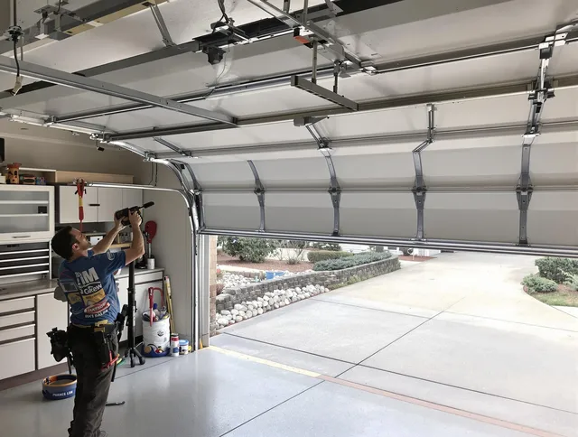 Garage door track repair service by Foxborough Garage Door Repair in Foxborough